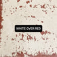 Paint swatch White over Red, aged and distressed.
