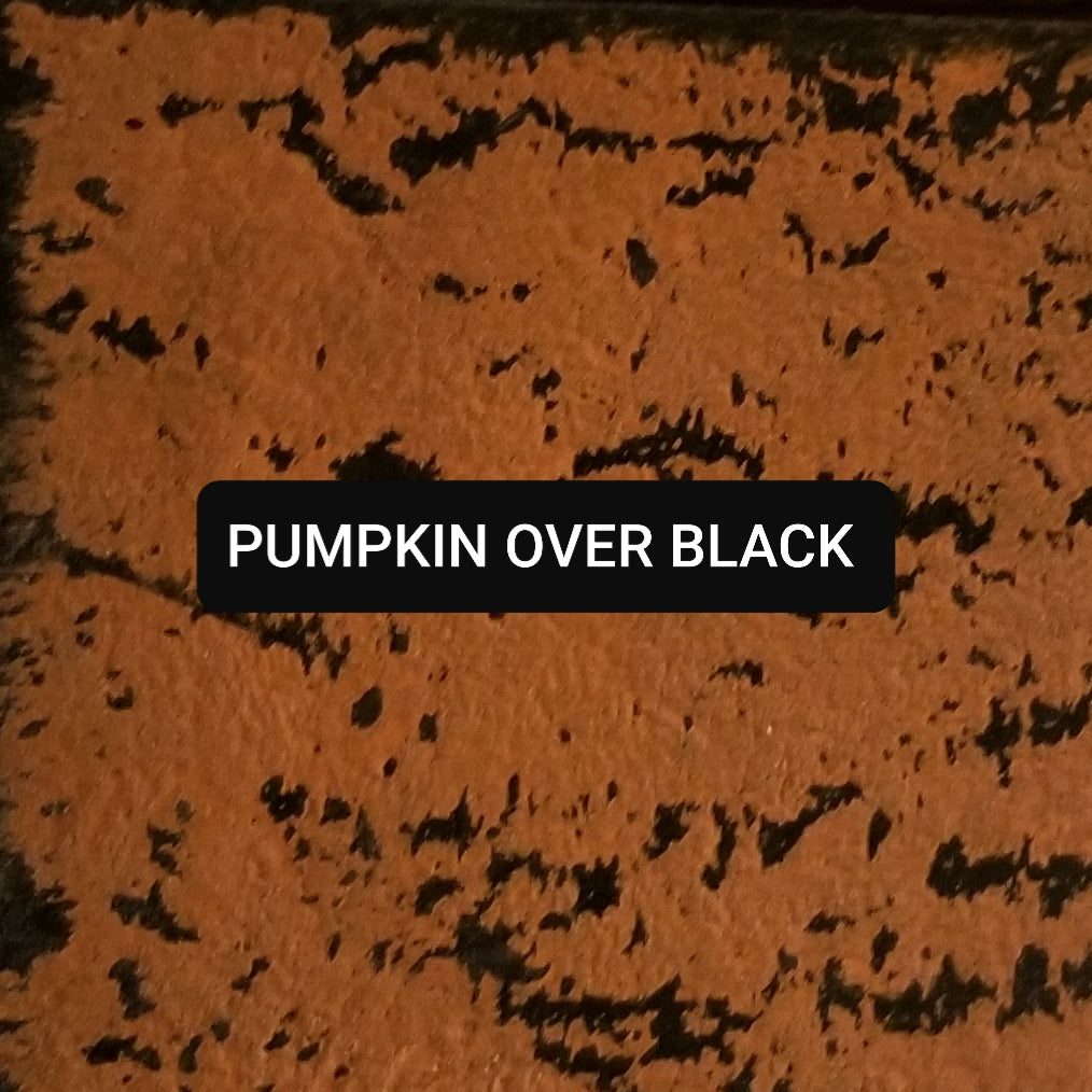 Paint swatch Pumpkin over Black, aged and distressed.