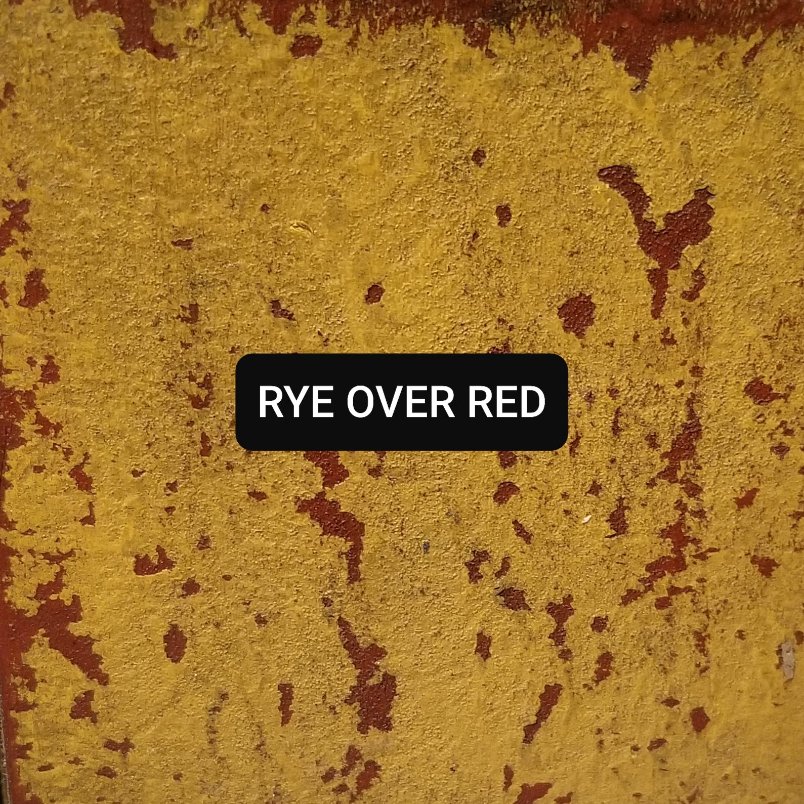 Paint swatch Rye over Red, aged and distressed.