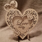 Layered "Love" conversation heart with filigree cuts and LED lights.