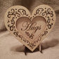 "Hugs" conversation heart with filigree cuts and LED lights. 