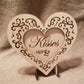 "Kisses" conversation heart with filigree cuts and LED lights. 