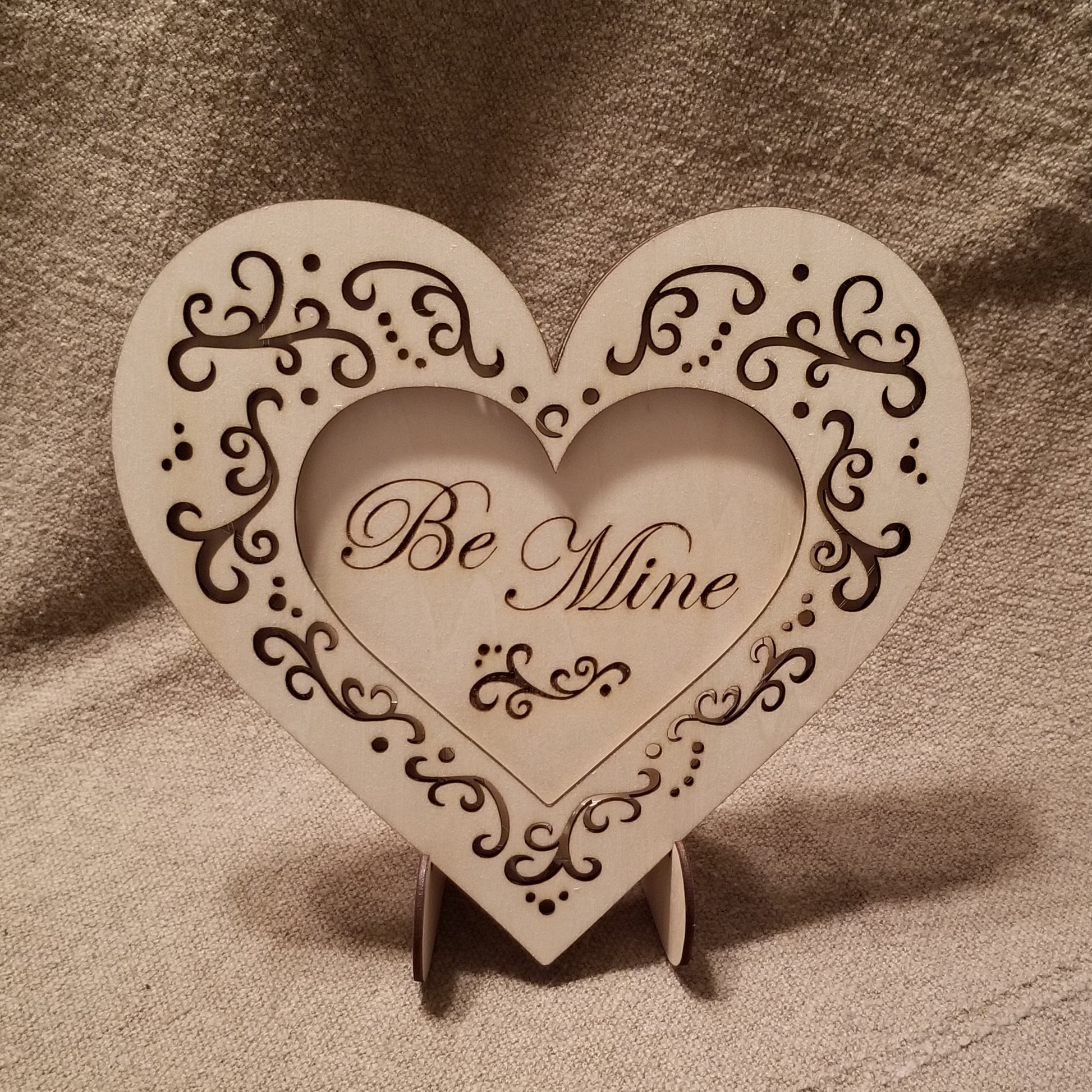 Be Mine conversation heart with filigree cuts and LED lights. 