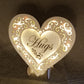 "Hugs" conversation heart with filigree cuts and LED lights. 