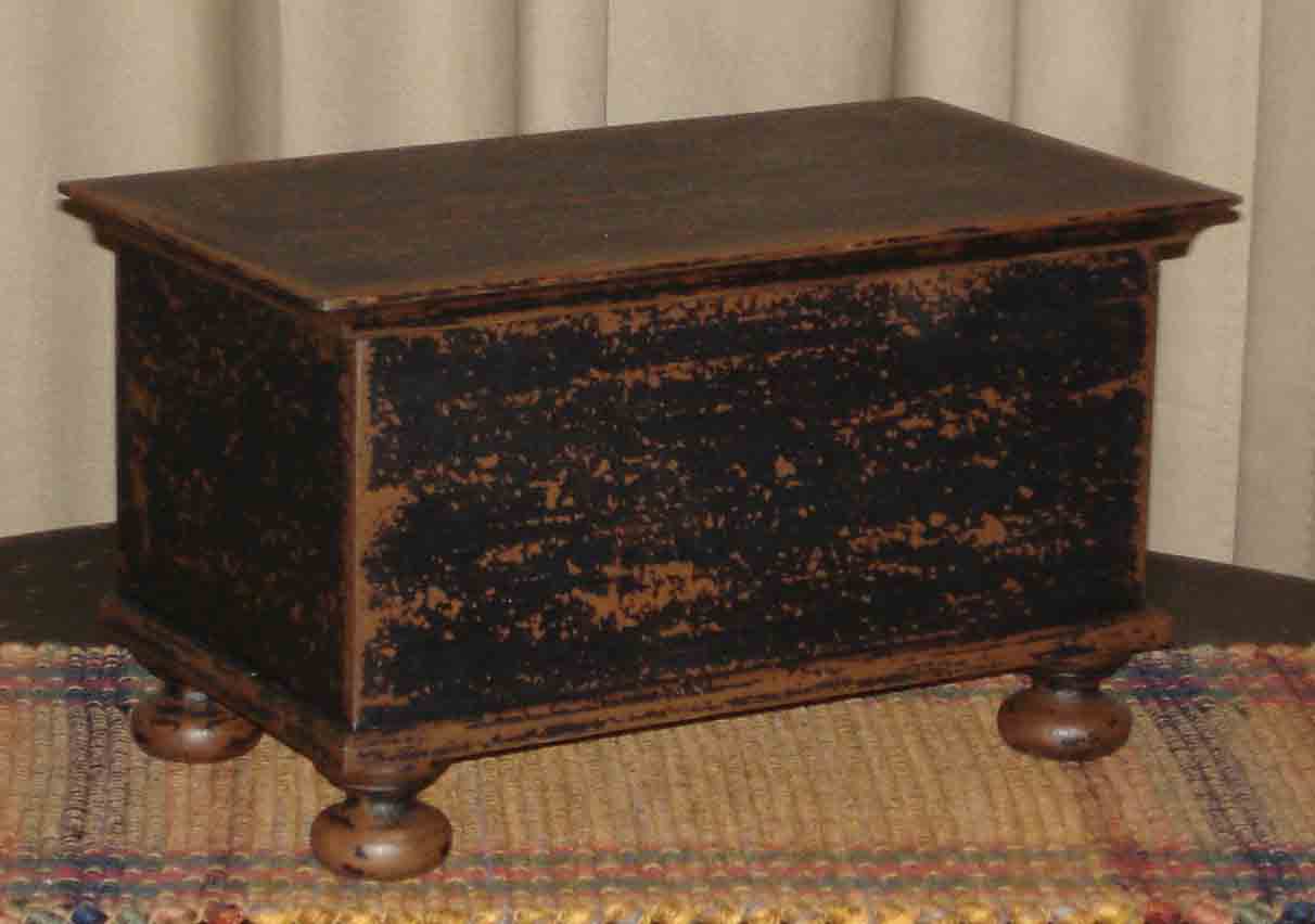 Black over Brown Wood Bunfoot Keepsake box. Handmade in Ohio. Box is hand painted & distressed. Our finish uses layers of color and aging that creates our unique look. Great for small treasures and keepsakes. Use in any room, on a table, mantle or shelf. Compliments design styles including primitive, farmhouse, rustic & traditional. 